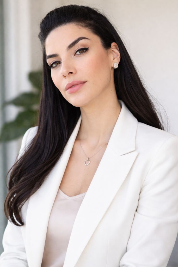 Professional portrait of Claudia Peña Gómez